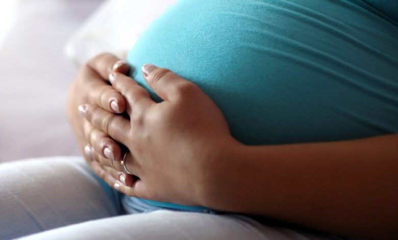 madre incinta del quarto figlio