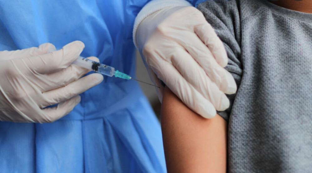 Vaccino Pfizer difficolta camminare farmacista